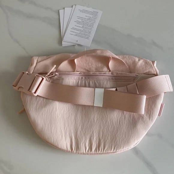 Lululemon Light Pink Curved Crossbody Bag